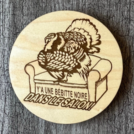 Un sous-verre en bois (Bébitte noire)